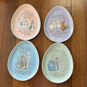 Pottery barn kids Peter Rabbit Easter melamine egg shaped plates. 40$ for set